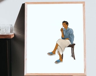 May include: A framed illustration of a person sitting on a stool and holding a cup. The person is wearing a blue shirt, white pants, and blue sandals. The background is white.