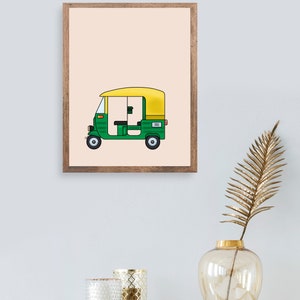 May include: A framed illustration of a green and yellow auto rickshaw, also known as a tuk-tuk, on a light peach background.