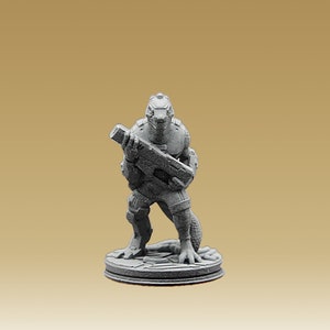 May include: A gray, detailed miniature figurine of a reptilian humanoid holding a weapon. The figurine is standing on a round base.