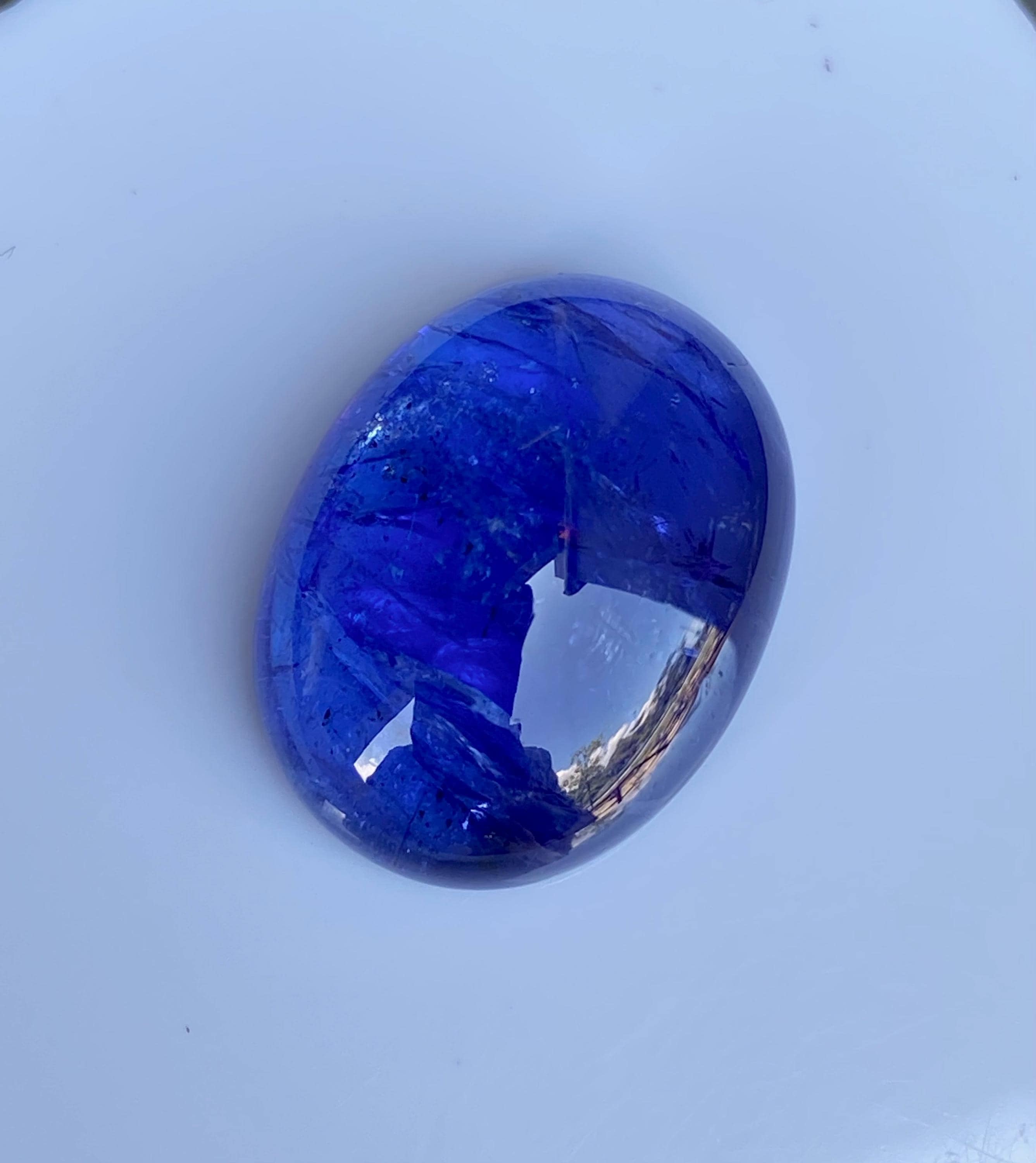 Violet Blue Tanzanite Cabochon 22.67CTS. AAA+ Color-loose
