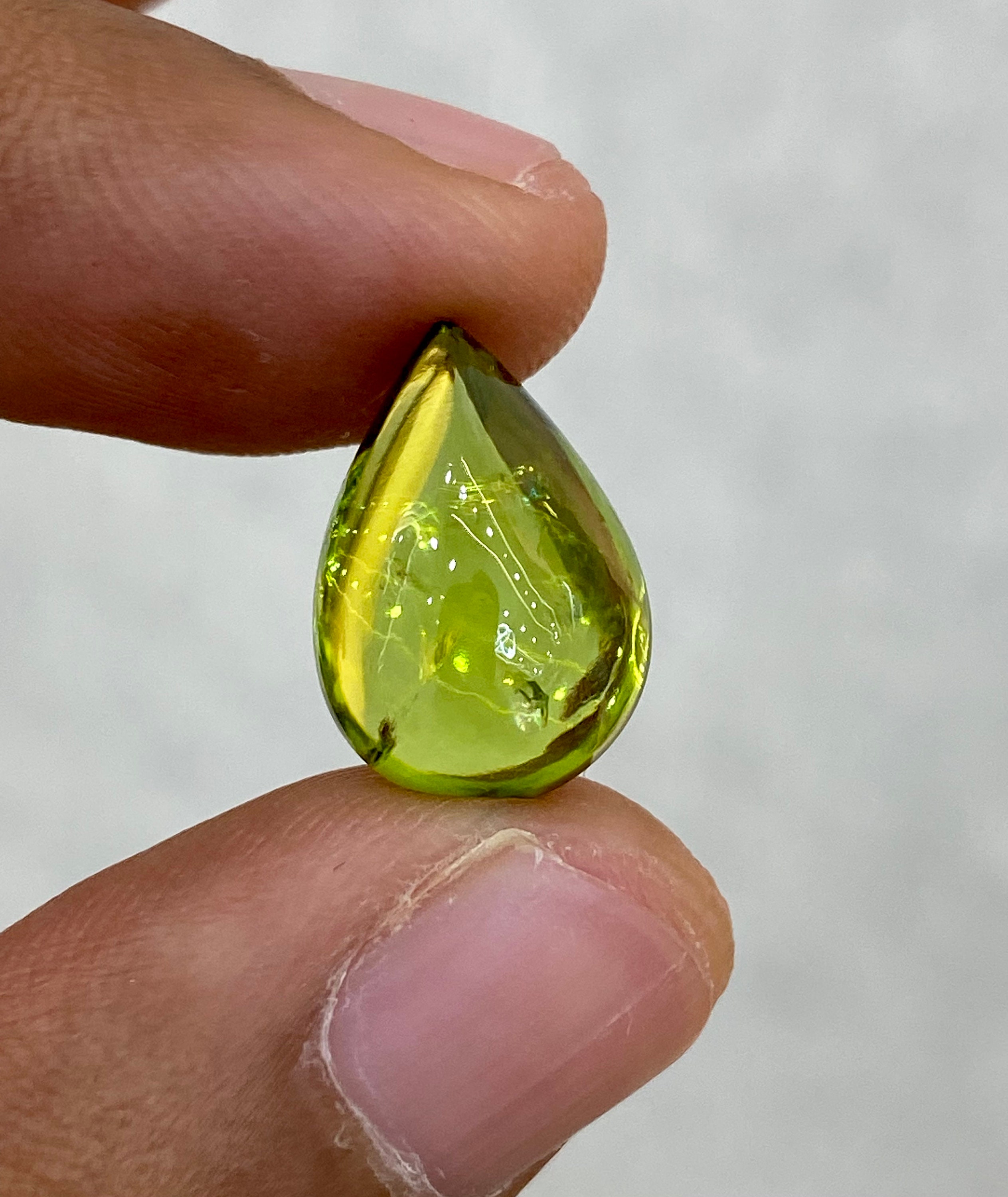 8.22CTS. Natural Peridot from Pakistan. Pears shape Cabochon peridot. Grass green color