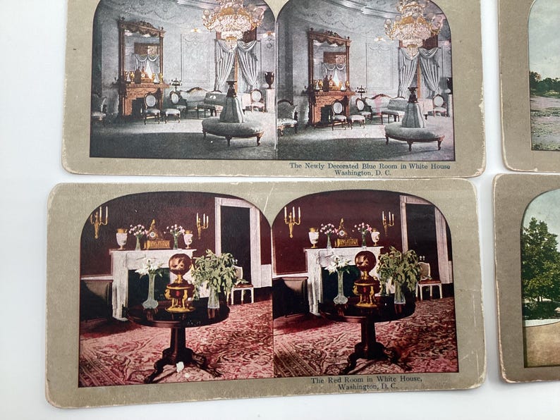 May include: Vintage stereoscopic cards depicting interior views of the White House. One card shows the "Newly Decorated Blue Room," and another, the "Red Room." The cards feature detailed images of the rooms' furnishings and decor.