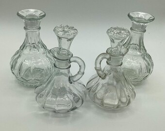 Vintage set of oil & vinegar c/w two vases.