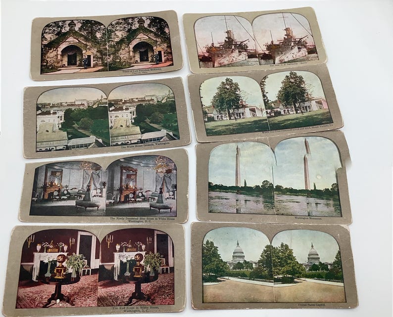 May include: A collection of vintage stereoscopic cards featuring historical landmarks and scenes. The cards depict buildings, monuments, and interiors, including the White House, Washington Monument, and U.S. Capitol. The cards are in sepia tones with color accents.