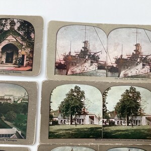 May include: A collection of vintage stereoview cards featuring historical landmarks and scenes. The cards depict the Tomb of President McKinley, the U.S. Battleship Maine, the White House Grounds, and Mount Vernon. The cards have a sepia tone and are in good condition.
