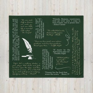 May include: Green throw blanket with gold text featuring famous quotes from Shakespeare plays. The quotes include "All the world's a stage", "To be or not to be", "Love looks not with the eyes, but with the mind", and more.