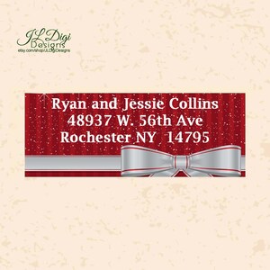 May include: Red and white striped Christmas address label with a silver bow. The label has the text "Ryan and Jessie Collins, 48937 W. 56th Ave, Rochester NY 14795".
