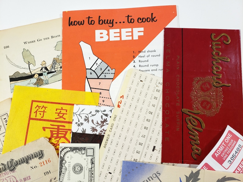 May include: A collection of vintage ephemera, including a beef cooking guide, a chocolate bar, a dollar bill, and various tickets and cards. The items are arranged on a white surface, with a variety of colors and textures.