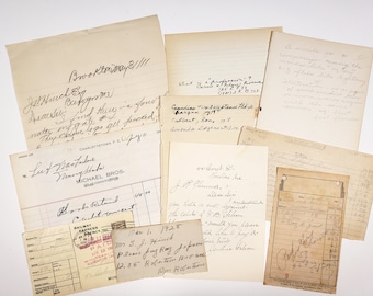 May include: A collection of vintage papers and documents with handwritten notes and text. The papers are yellowed with age and have a worn, antique look. Some of the text includes "Broadway", "Michael Bros", "Railway Express", and "Dec 1, 1928".