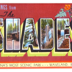 May include: A vintage postcard with a red background and the text "Greetings from The Shades" in black letters. The letters are filled with images of a forest, a waterfall, and a cabin. The text "Indiana's Most Scenic Park...  Waveland, Indiana" is at the bottom of the postcard.