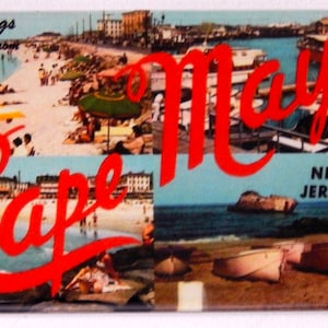 May include: A vintage postcard featuring a collage of images of Cape May, New Jersey. The postcard has a red and white text overlay that reads "Greetings from Cape May, New Jersey". The postcard features images of a beach, a boardwalk, and boats.