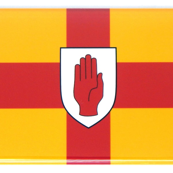 May include: A red hand on a white shield, centred on a yellow and red chequered flag. The flag has a red cross on a yellow background.