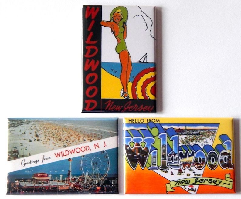 May include: Three vintage postcard magnets featuring images of Wildwood, New Jersey. The first magnet shows a woman in a swimsuit standing on a beach with the words "Wildwood, New Jersey". The second magnet shows a view of the Wildwood boardwalk with the words "Greetings from Wildwood, N.J.". The third magnet shows a stylized image of the words "Wildwood, New Jersey" with a view of the city in the background.