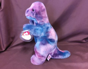 TY Beanie Buddy "Rex" the Tyrannosaurus Rex Dinosaur. New, never played with. Stored in a smoke free home. All tags in place. Vintage 1999.