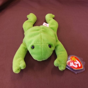 TY Beanie Baby "Legs" the Frog. New, never played with. Stored in a smoke free home. All tags in place. Vintage 1993.