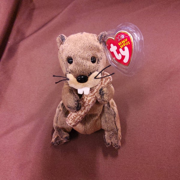 TY Beanie Baby "Lumberjack" the Beaver. New, never played with. Stored in a smoke free home. All tags in place. Dated 2003.