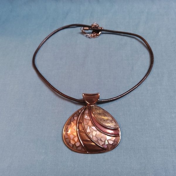 Lia Sophia  Mother of Pearl Shell Gunmetal Pendant Necklace with Black Cord. Maker's mark present.