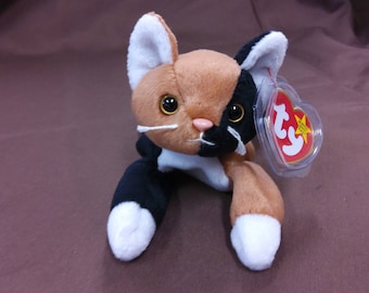 TY Beanie Baby "Chip" the Calico Cat. New, never played with. Stored in a smoke free home. All tags in place. Vintage dated 1996.