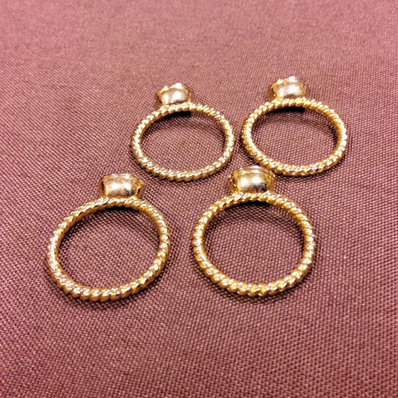 Set of Four Goldtone Metal Stackable Rings each w… - image 5