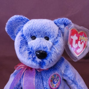TY Beanie Baby periwinkle the Bear. New, Never Played With. Stored in a