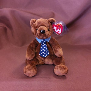 TY Beanie Baby &quot;Hero&quot; the Bear. Great Father&#39;s Day Gift. New, never played with. Stored smoke free. All tags in place. Vintage dated 2001.