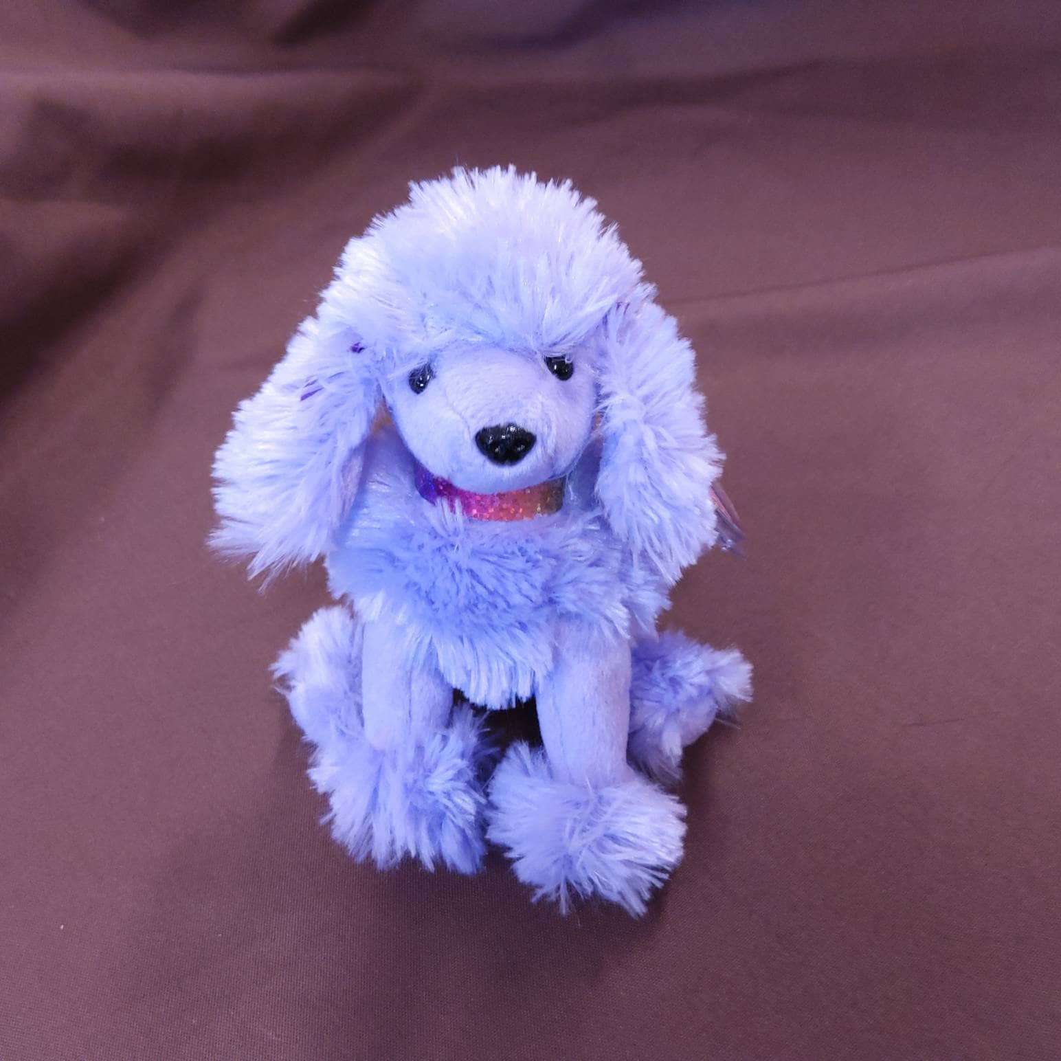 purple poodle stuffed animal