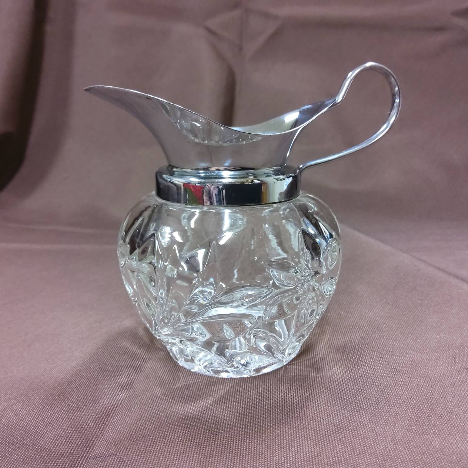 Small Cut Glass Pitcher With Silvertone Spout and Handle. No Maker's Mark  Found. Floral Designs in the Clear Cut Glass. 