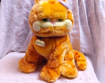 TY Beanie Buddy "Garfield" the Cat from the movie. New, never played with. Stored in a smoke free home. All tags in place.