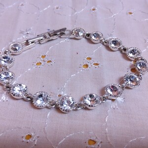 SAQ Vintage Signed Silvertone and Crystal Link Bracelet  display picture 2