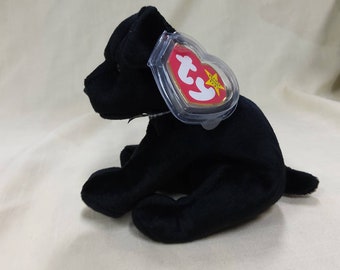 TY Beanie Baby &quot;Luke&quot; the Black Labrador. New, never played with. Stored in a smoke free home. All tags in place. Vintage dated 1999.