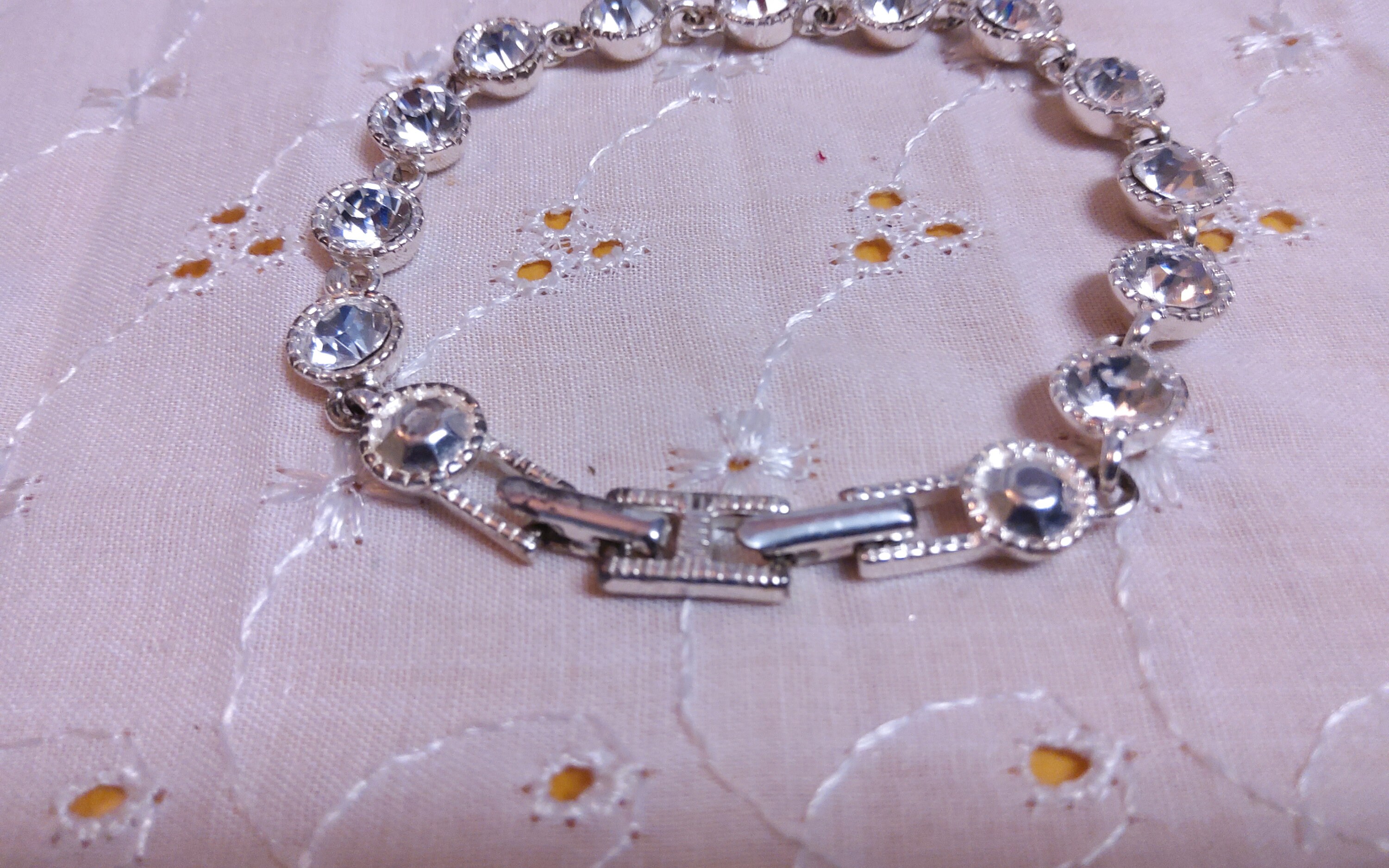 SAQ Vintage Signed Silvertone and Crystal Link Bracelet. Maker's