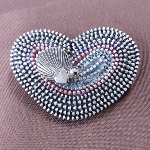 Heart Shaped Brooch  handcrafted from Zippers with Silvertone Bead, Heart and Scallop Accents at the center. Great craftsmanship.