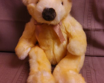 TY Classic Plush "Butterbeary" the Yellow Bear. New, never played with. Stored in a smoke free home. All tags in place. Vintage dated 1999.