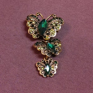 Beautiful Trio of Butterflies Brooch - Goldtone Metal Embellished with Rhinestones in different shades of green. No maker&#39;s mark.