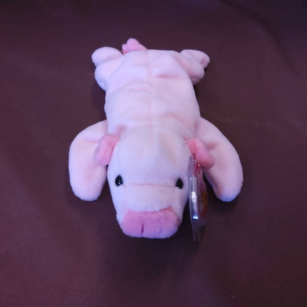 TY Beanie Baby "Squealer" the Pink Pig. New, never played with. Stored smoke free. All tags in place. Vintage dated 1993.