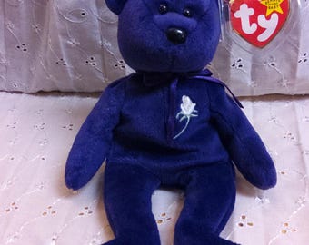 TY Beanie Baby "Princess" the Bear that honors Princess Diana. New, never played with. Stored smoke free. Heart Tag creased, price. 1997.