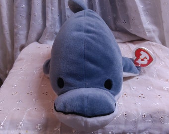 Ty Pillow Pals "Glide" the Dolphin. New, never played with. Stored in a smoke free home. All tags in place. Vintage.