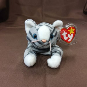TY Beanie Baby "Prance" the Cat. New, never played with. Stored in a smoke free home. All tags in place. Vintage dated 1997.