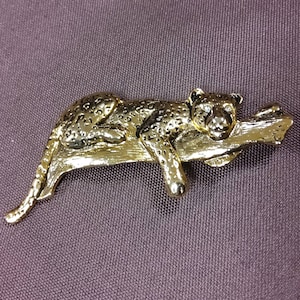 LEOPARD - Goldtone Metal Brooch with the Leopard Lying on a Tree Branch. Great Details in the Metalwork. No maker&#39;s mark found.