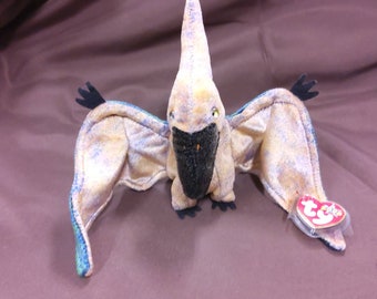 TY Beanie Baby "Swoop" the Pterodactyl. New, never played with. Stored in a smoke free home. All tags in place. Vintage dated 2000.