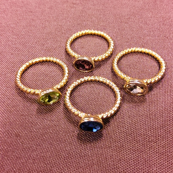 Set of Four Goldtone Metal Stackable Rings each w… - image 7