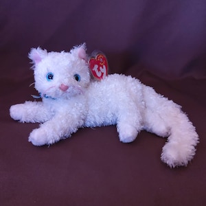 TY Beanie Baby "Starlett" the White Cat. New, never played with. Stored in a smoke free home. All tags in place. Dated 2001.