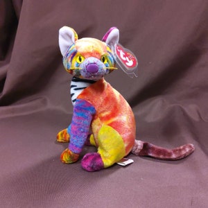 TY Beanie Baby "Kaleidoscope" the Colorful Cat. New, never played with. Stored in a smoke free home. All tags in place. Vintage dated 2000.