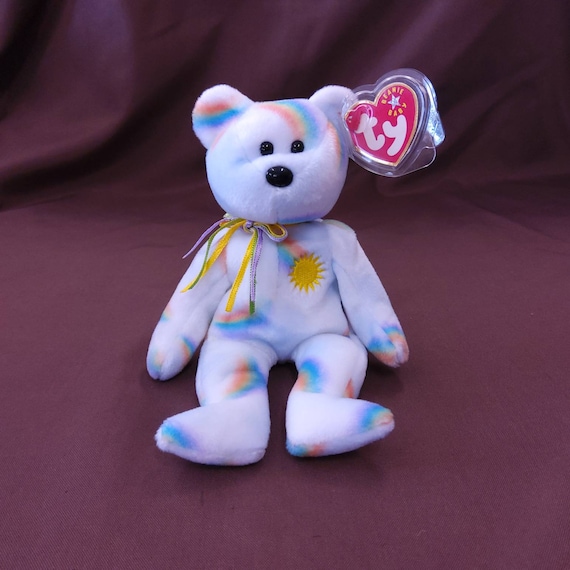 TY Beanie Baby "Cheery" the Bear. New, never played with. Stored in a smoke free home. All tags in place. Vintage dated 2001.