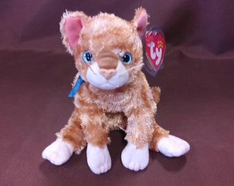 TY Beanie Baby "Mattie" the Cat. New, never played with. Stored in a smoke free home. All tags in place. Dated 2002.