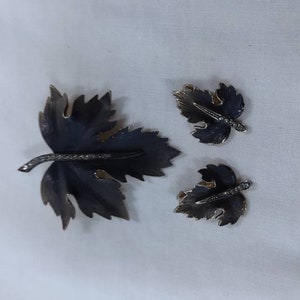 LEAF Brooch and Clipped Earrings - VINTAGE Goldtone Metal with Black Antiqued Affect and Rhinestone Accents along the Stem. No maker&#39;s mark.