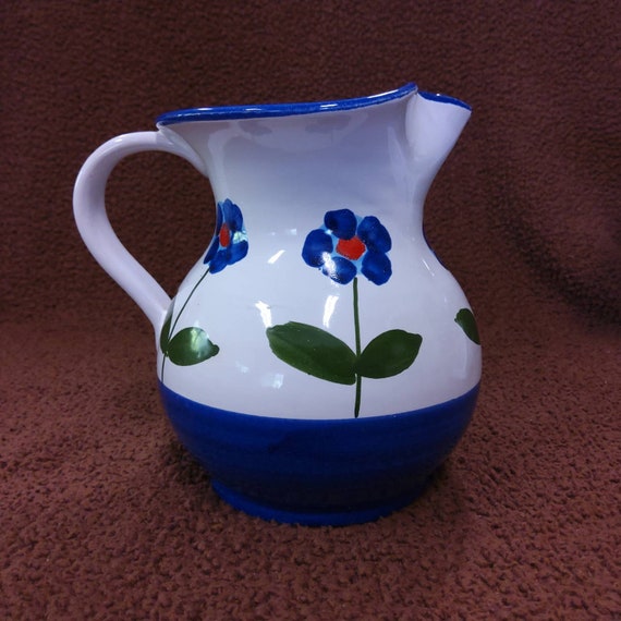 Blue and White Floral Italian Pottery Pitcher. Marked Italy on the