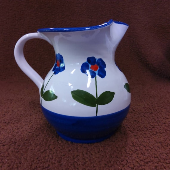 Blue and White Floral Italian Pottery Pitcher. Marked Italy on the