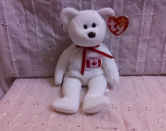 TY Beanie Baby "Maple" the Canadian Bear. New, never played with. Stored in a smoke free home. All tags in place. Vintage, dated 1996.