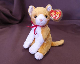 TY Beanie Baby "Tangles" the Cat. New, never played with. Stored in a smoke free home. All tags in place. Dated 2003.